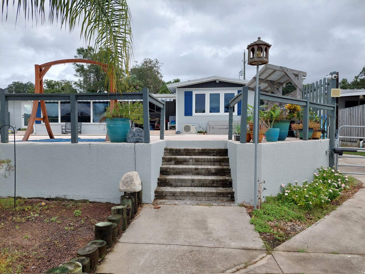 Official measurement of the waterline in the workshop was 25-inches 🙄 Last pic shows house elevation compared to the yard for those asking. The water came halfway up the bottom step. #HurricaneNicole #dogsoftwitter #creeklife