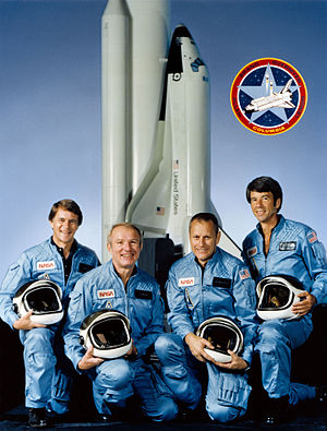 STS-5 crew photo with Commander Vance D. Brand, Pilot Robert F. Overmyer, and Mission Specialists Joseph P. Allen and William B. Lenoir.