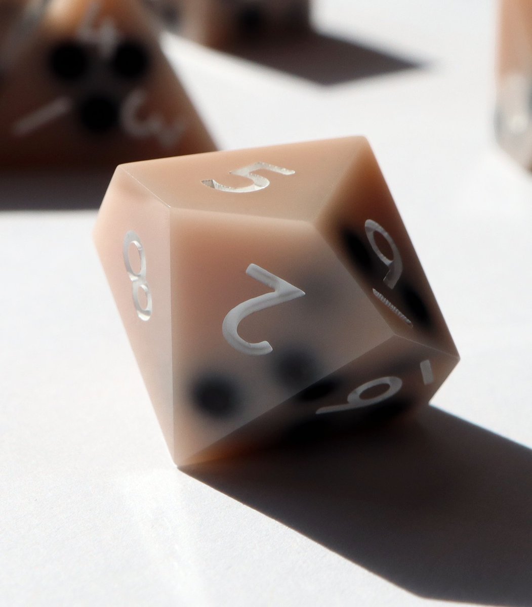 EVERYTHINGDICE's tweet photo. Milk Tea Boba Dice! This is the classic flavor variant. 🧋 Available now on our webstore! #dnd #ttrpg #dice https://t.co/9qSOUXwQRl