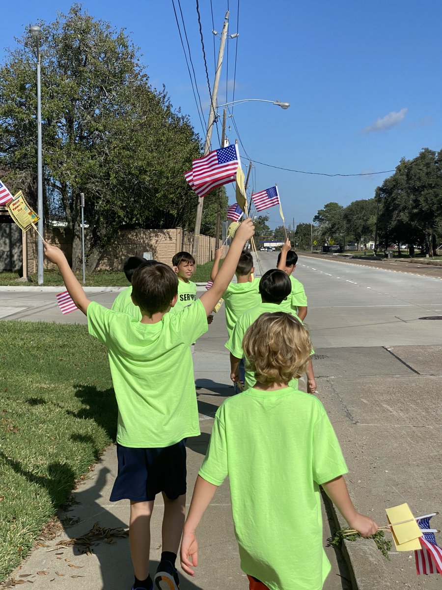 Ms. Garcia's 3rd grade class participating in Alvin Serves Day! They added flags for Veteran's Day to yards in the Somerset neighborhood! #alvinisdserves