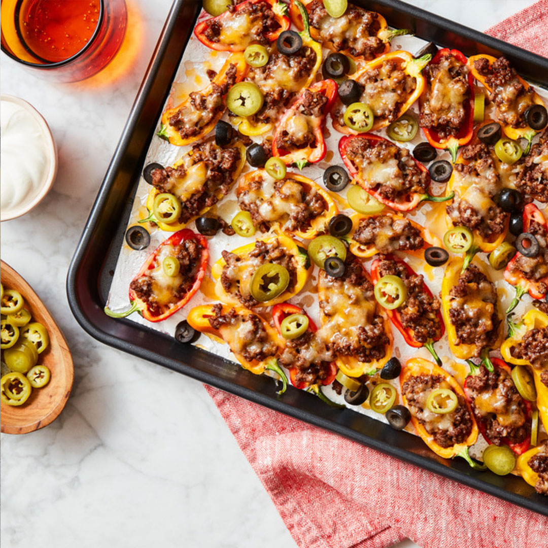 Add a little spice to Sunday’s hottest football matchups with our Mini Pepper Nachos—made with plenty of melty Mexican Style Shredded cheese and an extra kick of jalapeño. Find the recipe at the link in bio.