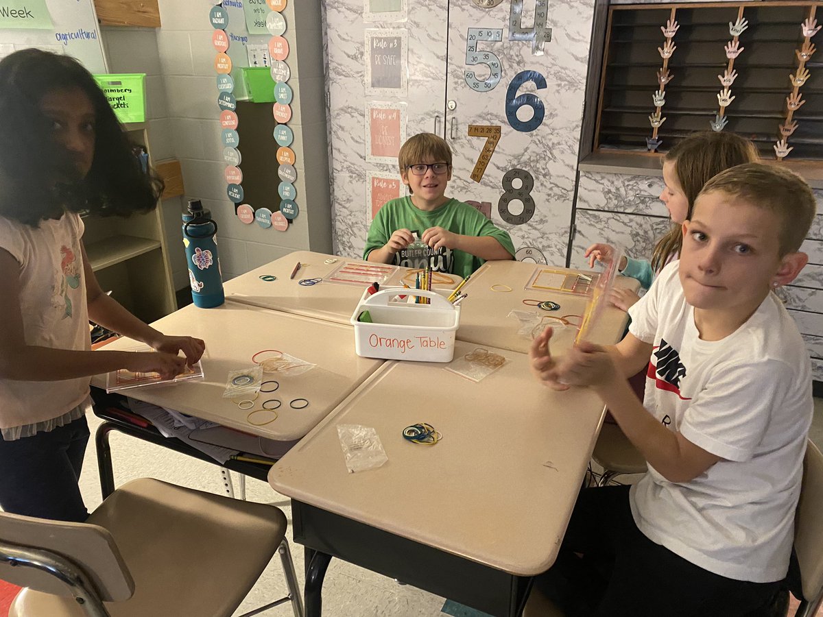 Students practiced fractions with geoboards. ➗