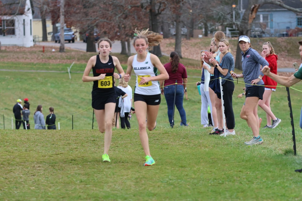 BillericaXCTF's tweet photo. Anna McElhinney continued her tremendous season by becoming the individual champion, running a huge personal best 5K time of 18:10, which is also the fastest time in school history. https://t.co/iPkpKGtTXK