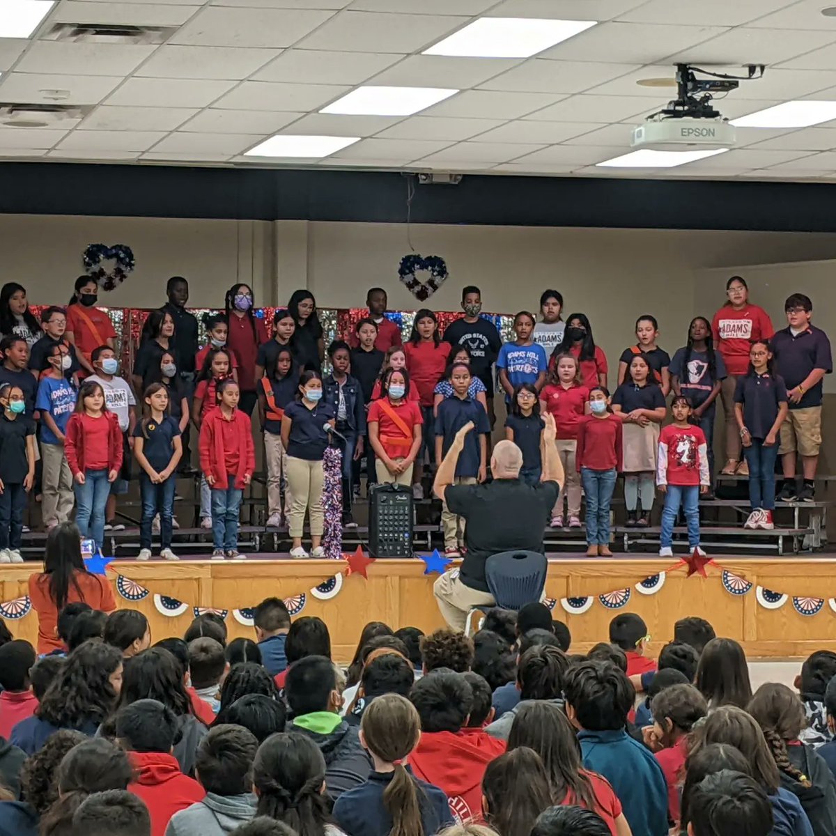 PeaseMSChoir's tweet photo. Awesome program, Patriot Choir! Mrs. Cabrera was able to be in the audience for the Adams Hill ES Veteran's Day program. The Patriots did an amazing job! @NISD_FineArts @NISDPease https://t.co/yS1QTBbXmh