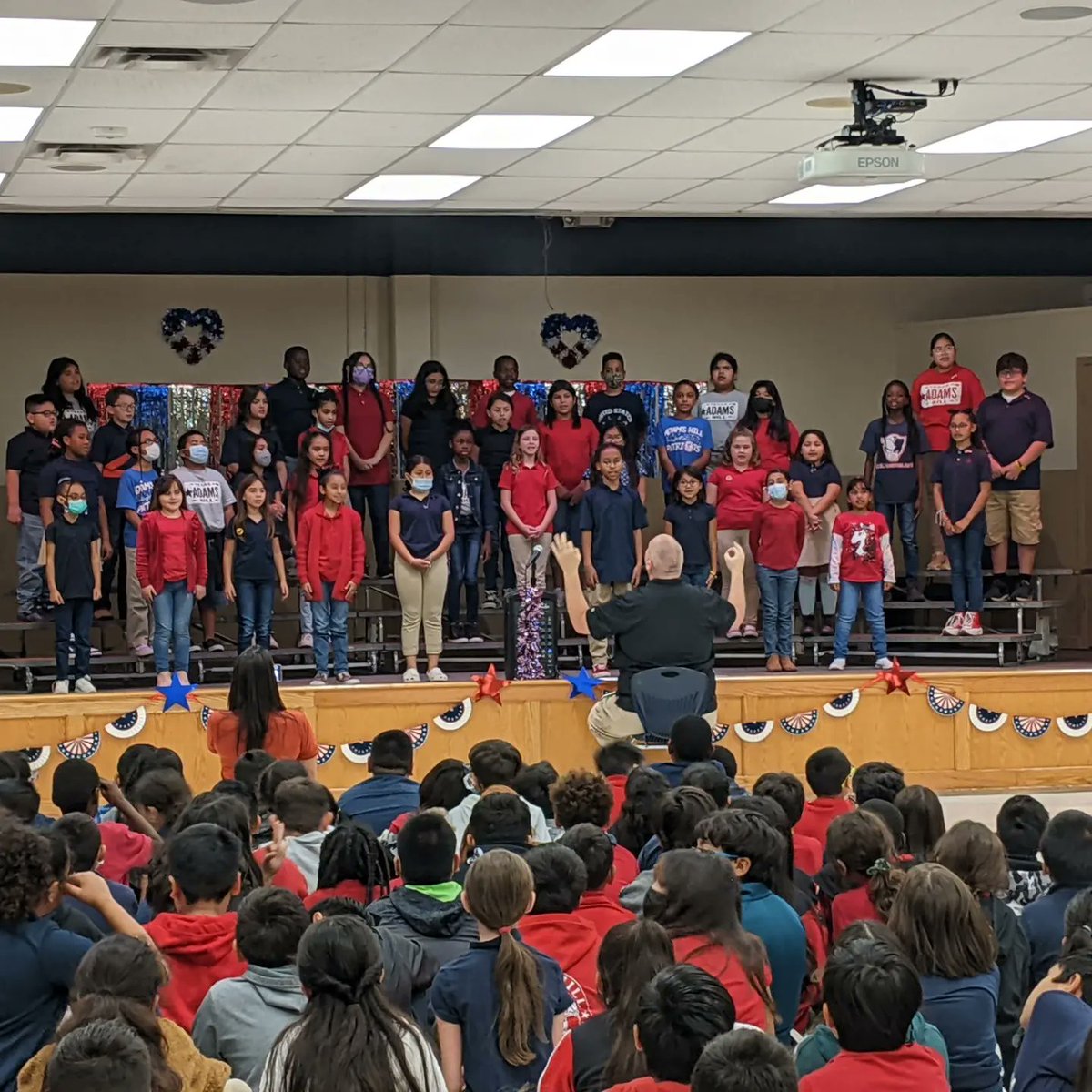 PeaseMSChoir's tweet photo. Awesome program, Patriot Choir! Mrs. Cabrera was able to be in the audience for the Adams Hill ES Veteran's Day program. The Patriots did an amazing job! @NISD_FineArts @NISDPease https://t.co/yS1QTBbXmh