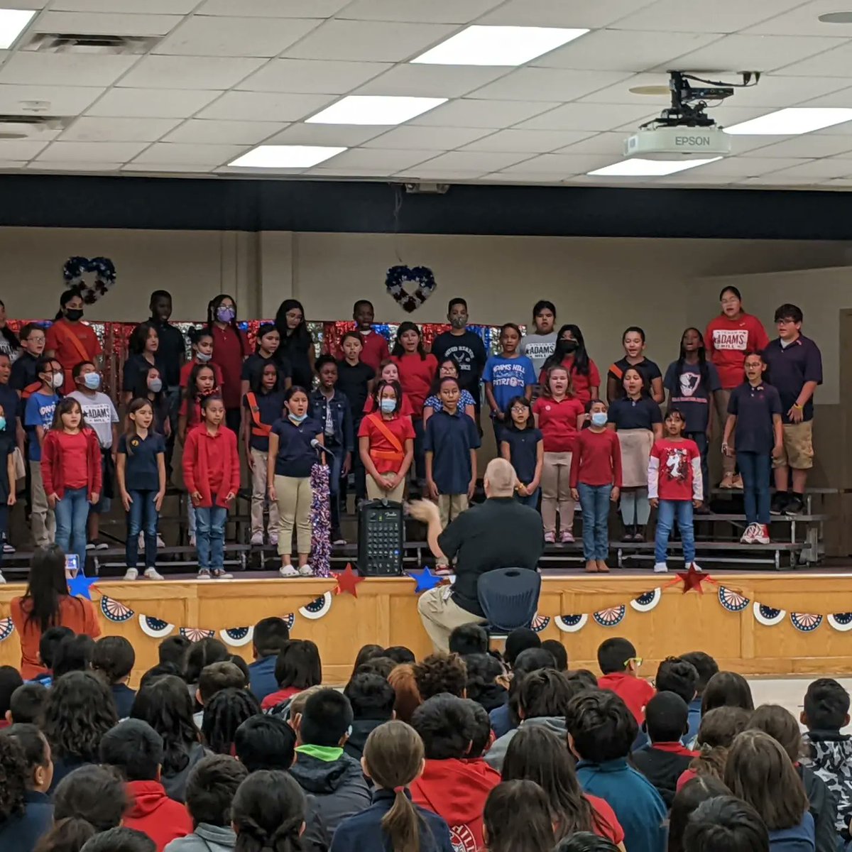 PeaseMSChoir's tweet photo. Awesome program, Patriot Choir! Mrs. Cabrera was able to be in the audience for the Adams Hill ES Veteran's Day program. The Patriots did an amazing job! @NISD_FineArts @NISDPease https://t.co/yS1QTBbXmh