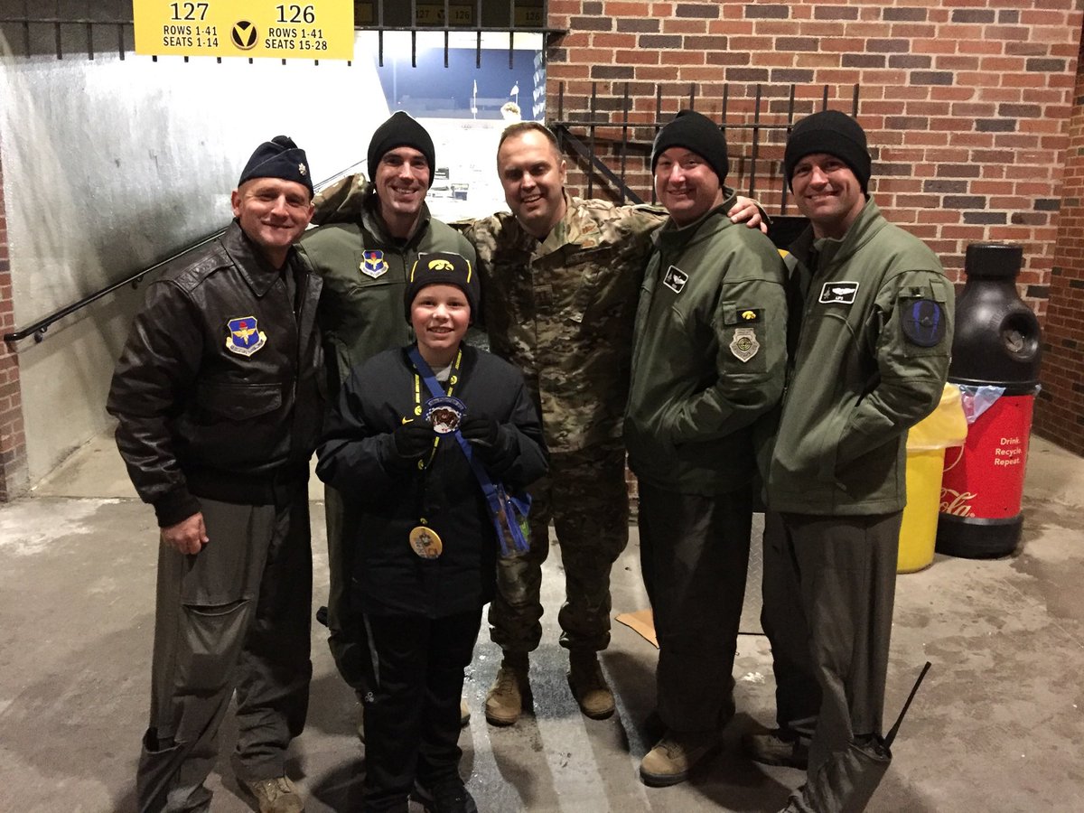 BrianRowe18's tweet photo. @higginized @HawkeyeFootball Can’t do just one!  😊 My son with George!  My son with the flyover pilots from the 2019 Penn St. home game; at Penn St. in 2020 (Covid game); my son and nephews with # 56 Nick DeJong after Penn St. in 2021. https://t.co/W1VD7uwdcG