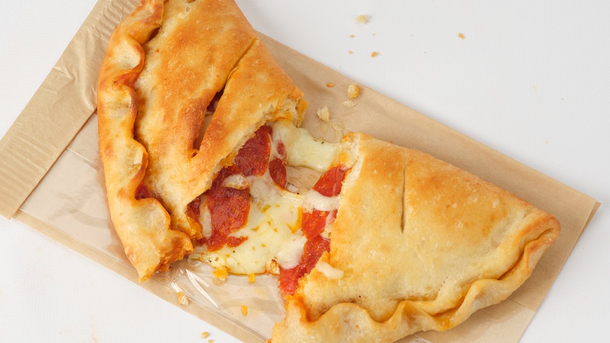 HotStuffPizza's tweet photo. a cheesy pep calzone almost makes you forget the sun sets at 4pm now. #hotstuffkitchen #hotstuffpizza https://t.co/mubQSWLX7g