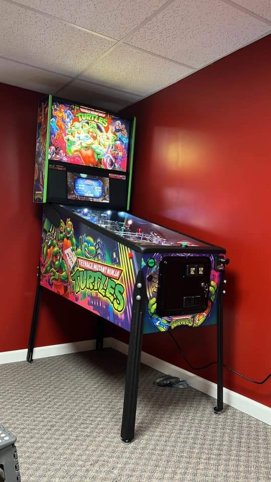 Mad_Pinball's tweet photo. Congratulations to Phil, Mulysa and the family on a new TMNT Pro from Stern Pinball!

That Mad Pinball poster will look great on the wall next to it!

https://t.co/VM5ZVu7ztm 

#GoMad #GetMad #MadPinball https://t.co/DblhFTU9FW