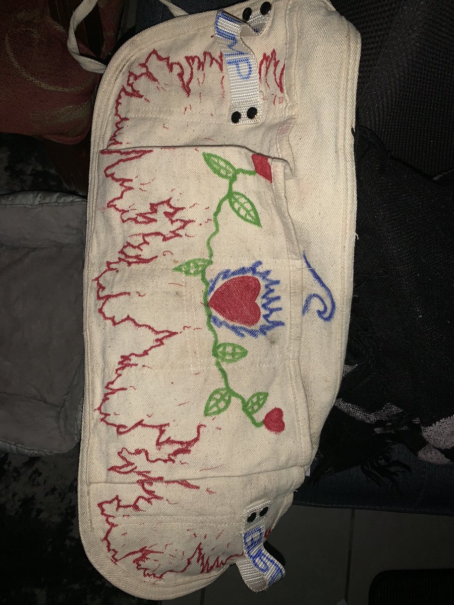 SLUMPPBUSTER's tweet image. My gardening apron was boring so I added what my middle school self would draw/doodle. #firegood