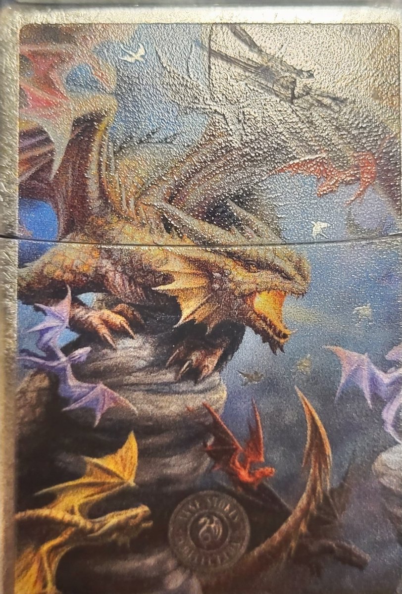 My newest <a href="/Zippo/">Zippo</a> first one in 3 years. Thanks to a very near and dear friend and my first from the Anne Stokes collection
