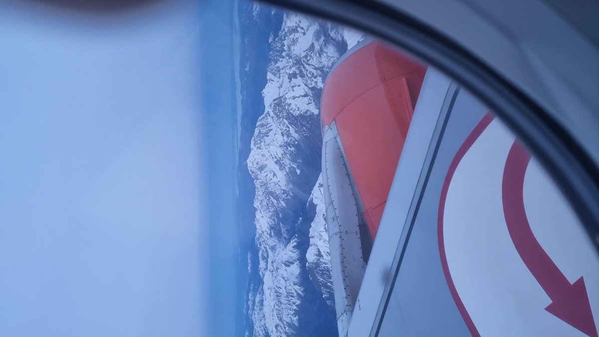 JHBowman's tweet photo. Flying over the Alps leaving Milan, a little snow, not long before we see them covered... let's see how the climate crises will affect skiing this year. #cop2022 https://t.co/nrkXgYanxB