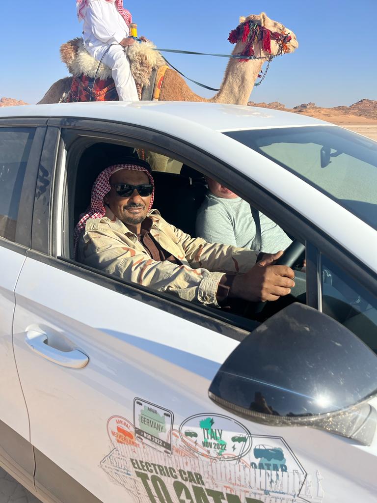 EVtoQatar's tweet photo. Just a standard Saturday afternoon for the team in an electric car in the desert racing the camels 😂 @scottyoung1818 Visit Jordan MG Motor Jordan - إم جي الأردن https://t.co/8KreMGHr6L