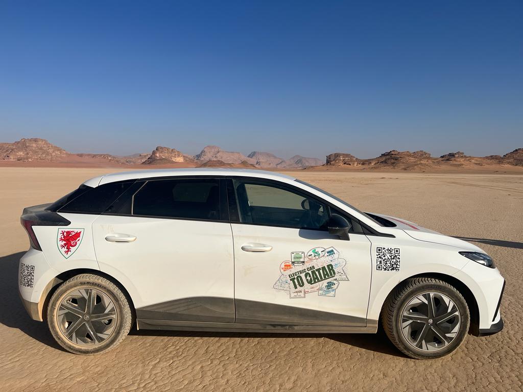 EVtoQatar's tweet photo. Just a standard Saturday afternoon for the team in an electric car in the desert racing the camels 😂 @scottyoung1818 Visit Jordan MG Motor Jordan - إم جي الأردن https://t.co/8KreMGHr6L