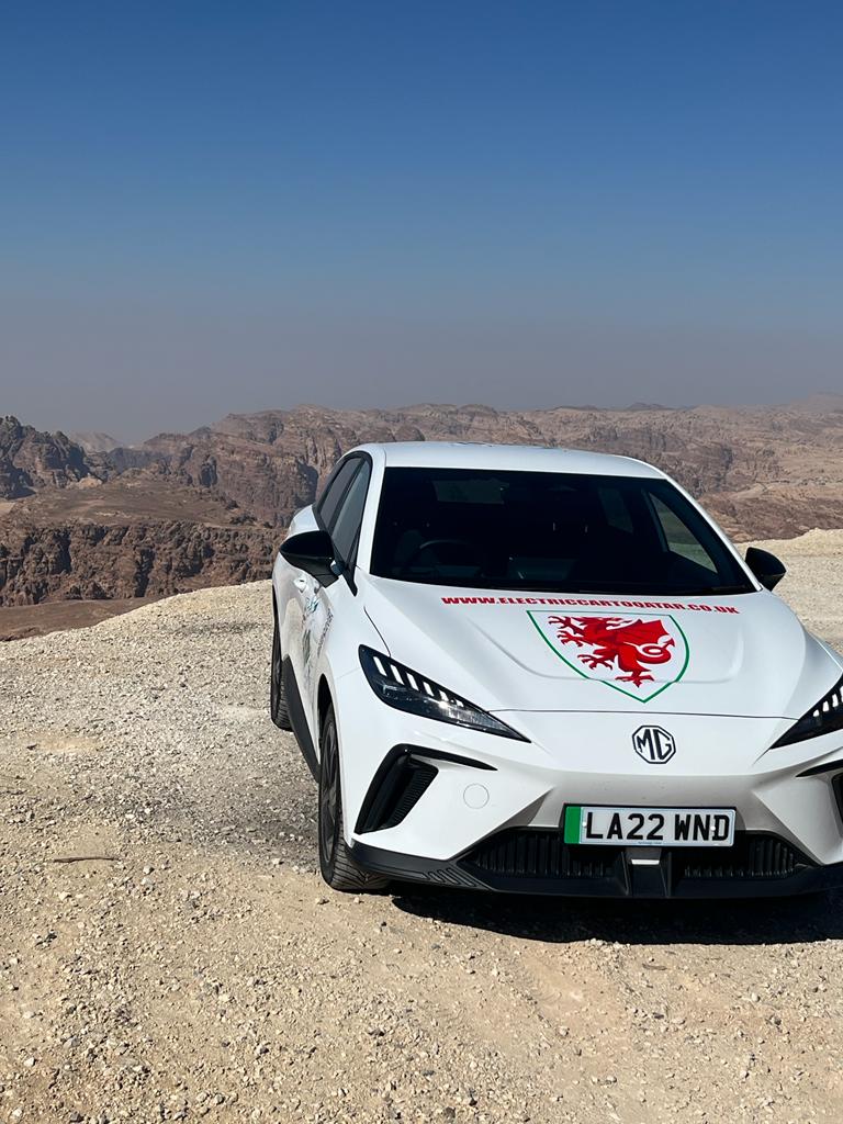 EVtoQatar's tweet photo. Just a standard Saturday afternoon for the team in an electric car in the desert racing the camels 😂 @scottyoung1818 Visit Jordan MG Motor Jordan - إم جي الأردن https://t.co/8KreMGHr6L