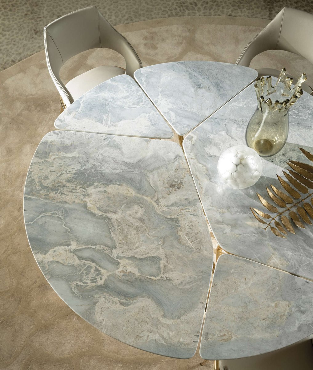 Another brand new design entering the world of #RobertoCavalli Home Interiors is the Baobab table. 

It's made of five marble pieces, inspired by the leaves and trunk of the Baobab tree. A stunning example of Italian design and craftsmanship.