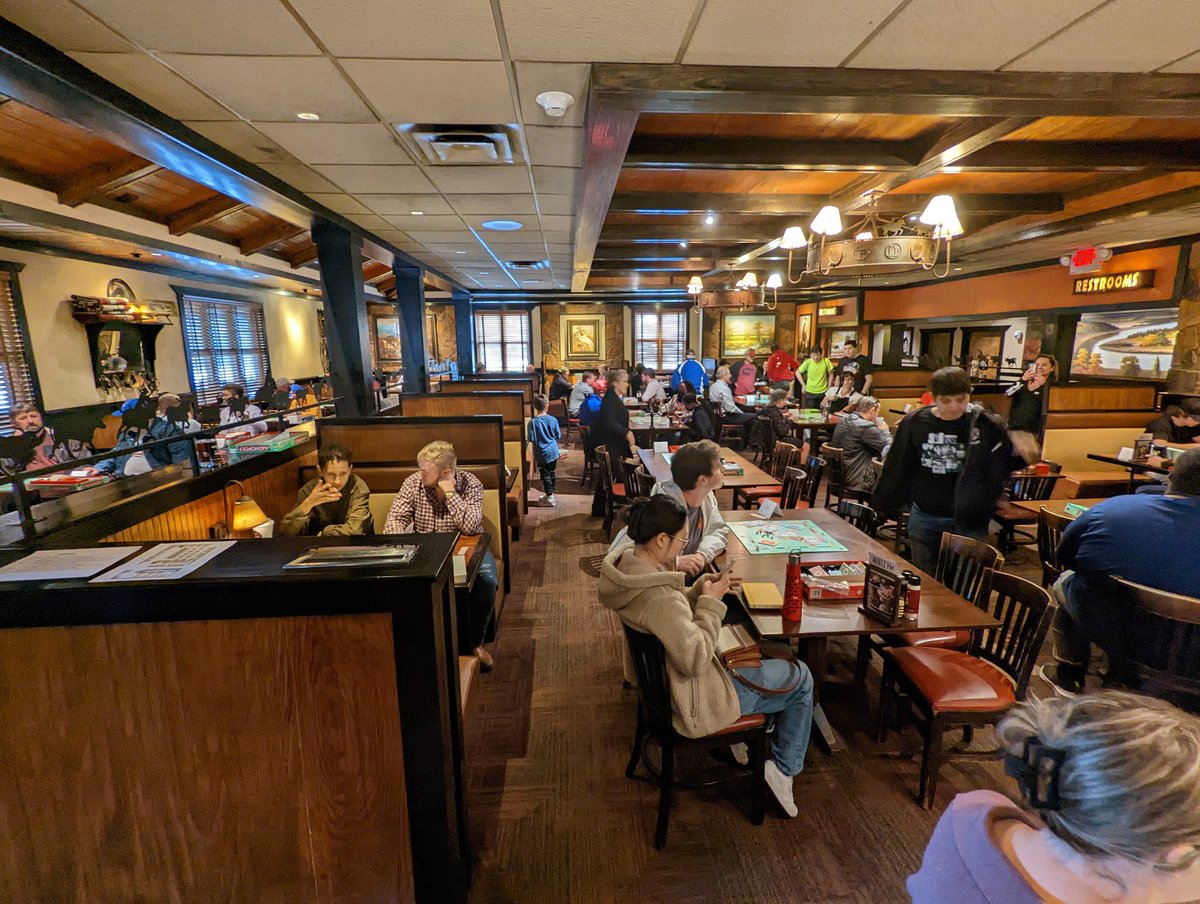 Y'all they rented out a whole Longhorn Steakhouse for this #Monopoly tourney. People watching is top tier. Lots of monopoly fits and accessories here.
