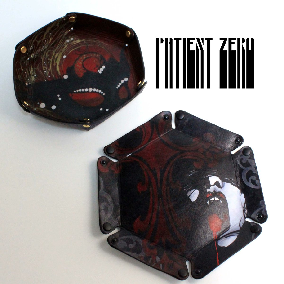 Those who donate get entered to win some of our giveaway prizes including these hand painted dice trays provided by Patient Zero

Watch us on Twitch buff.ly/3n1xAop  
Donate Here: buff.ly/3hC2sOT 

#Giveaway #DiceTrays #ExtraLife #Leather #Zombie
