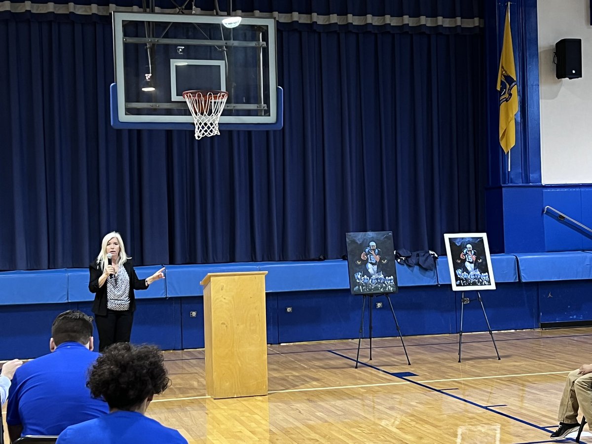 WHSAthletics234's tweet photo. Today, we dedicated the painting titled “Panther Pride” by alumnus Edgar Brown ‘82 to WHS in honor of David Popek ‘06 (centerpiece of painting) and all current and former Wallington High athletes. Pictured is David’s mother, Barbara Popek speaking at the ceremony #PantherPride https://t.co/Gm8KTwR6fp
