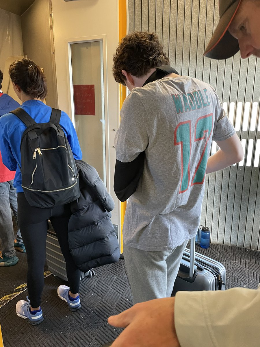 AmyRepke's tweet image. 24hrs post surgery, Jay’s determined to “waddle” [little whoosie] from DCA to MIA for @MiamiDolphins game. Waaay BETTER than a car for #16 bday gift 🐬 #FinsUp @D1_JW