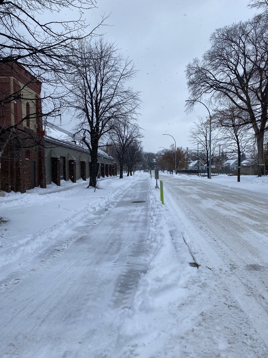 kat_lo__'s tweet photo. Happy to report that the Assiniboine/Granite/Westminster bike lanes are plowed and a welcome reprieve from the brown sugary side streets! It’s an idyllic winter wonderland out there. https://t.co/6uUGewMqwe