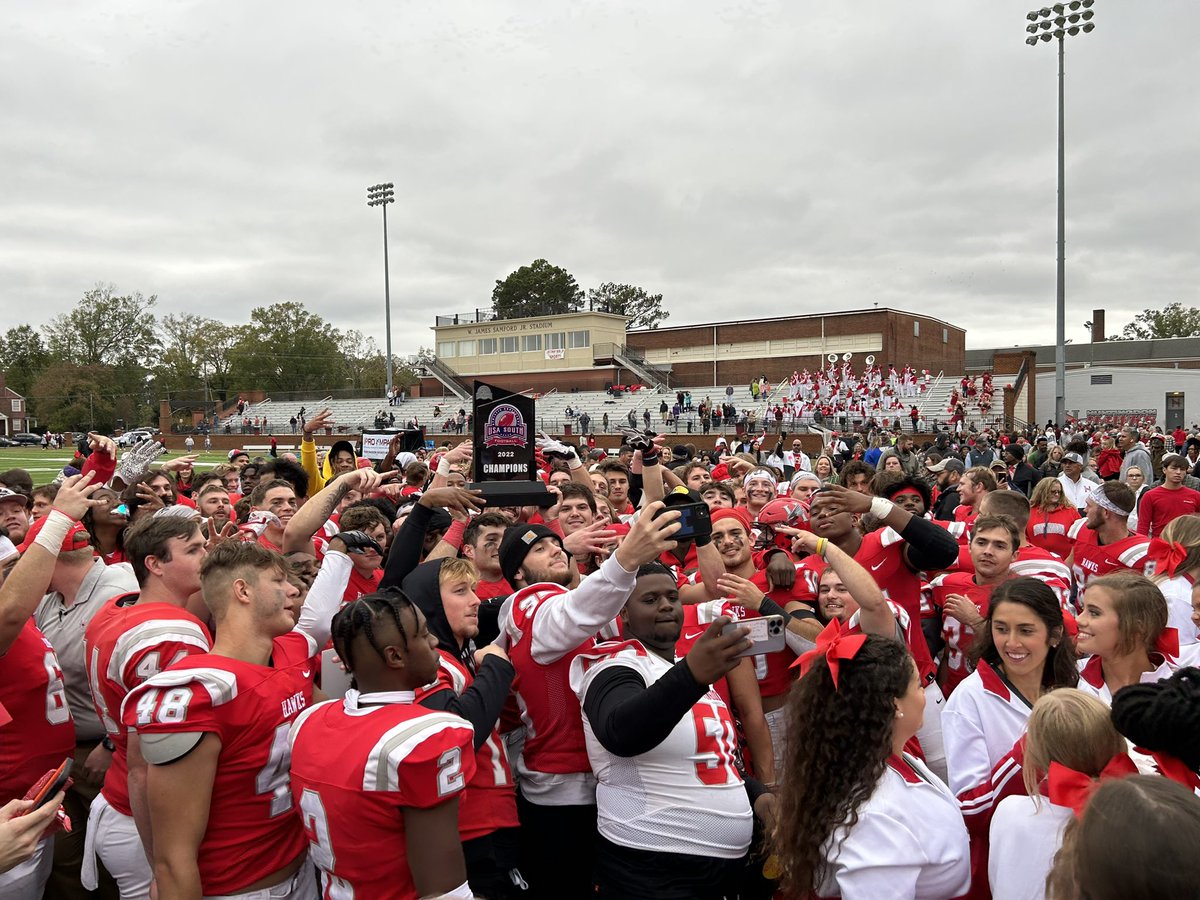 HawksFootball's tweet photo. The Hawks are your USA South Champions for the 4th time in a row and 7th time in the last 8 years! It’s never easy and it never gets old. #HawkEm https://t.co/mbrAqv77rv