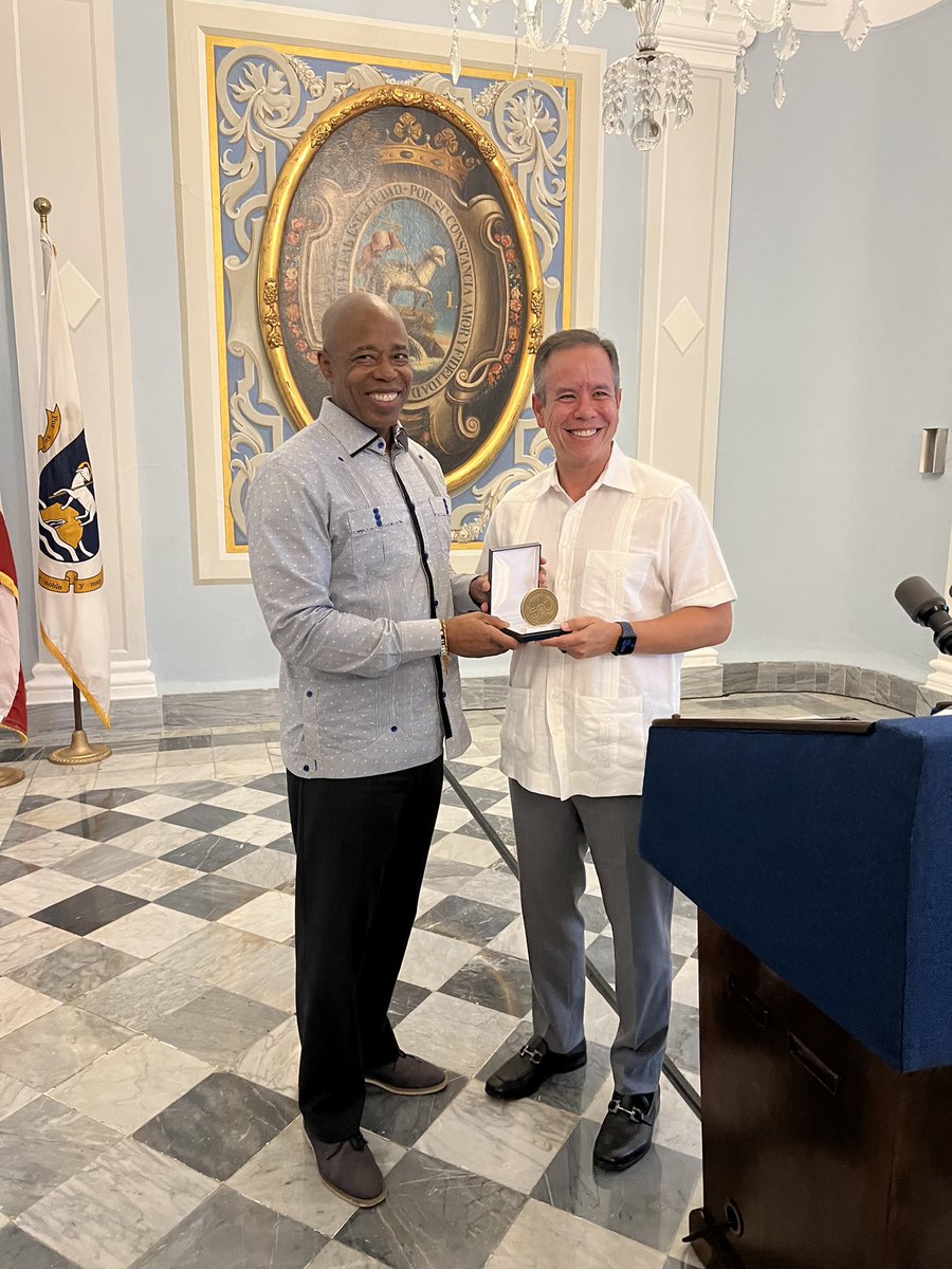 NYCMayor's tweet photo. Joined my friend and colleague Mayor @Miguel_Romero_ to talk about the bond between New Yorkers and our fellow Americans in Puerto Rico. 

Humbled to receive the 500th Anniversary of the Founding of San Juan Medal for the work NYC did after Hurricane Fiona. https://t.co/kpUYKpfJPJ