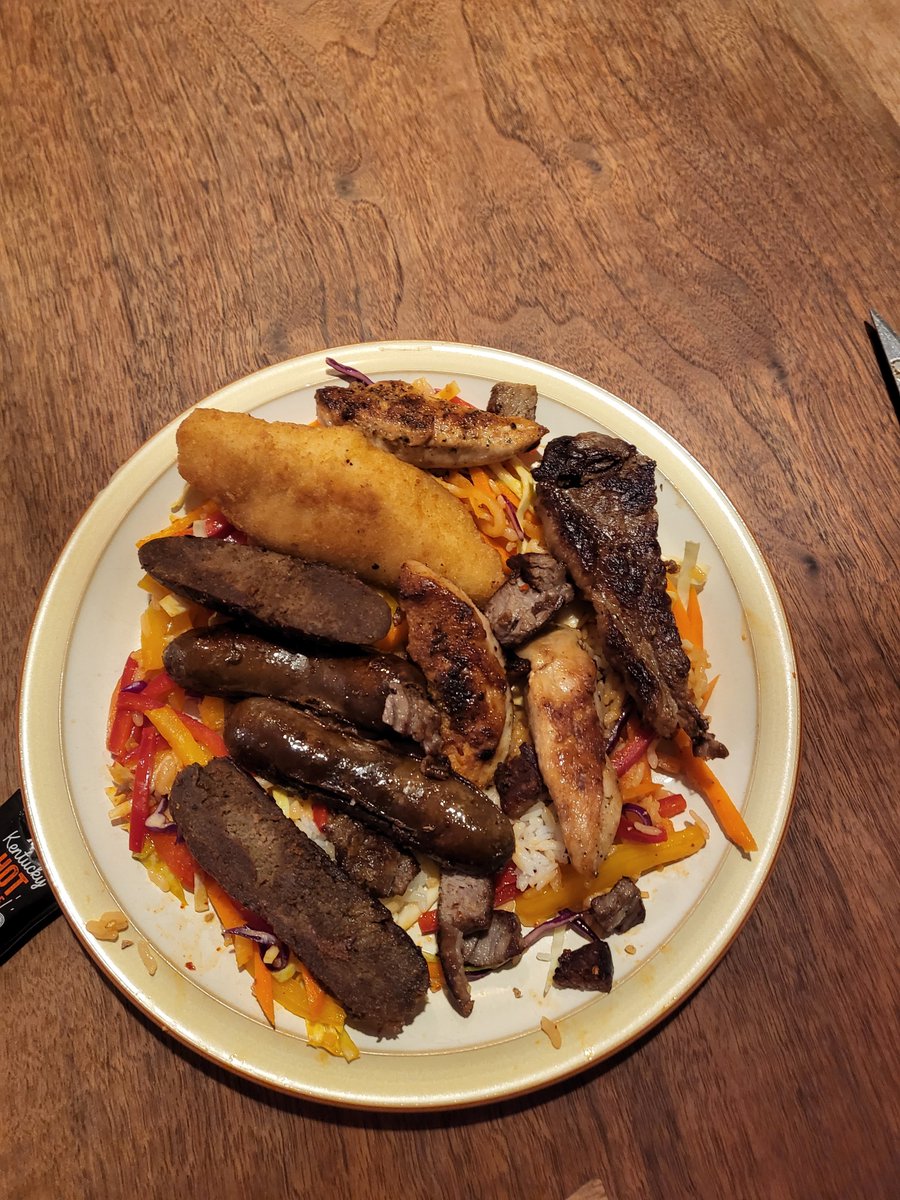 roddy027's tweet photo. I'm gonna guess I'm the only one on the planet tonight eating...fish, chicken, beef, moose and caribou on one plate! #notvegan https://t.co/89BgjCJdIL