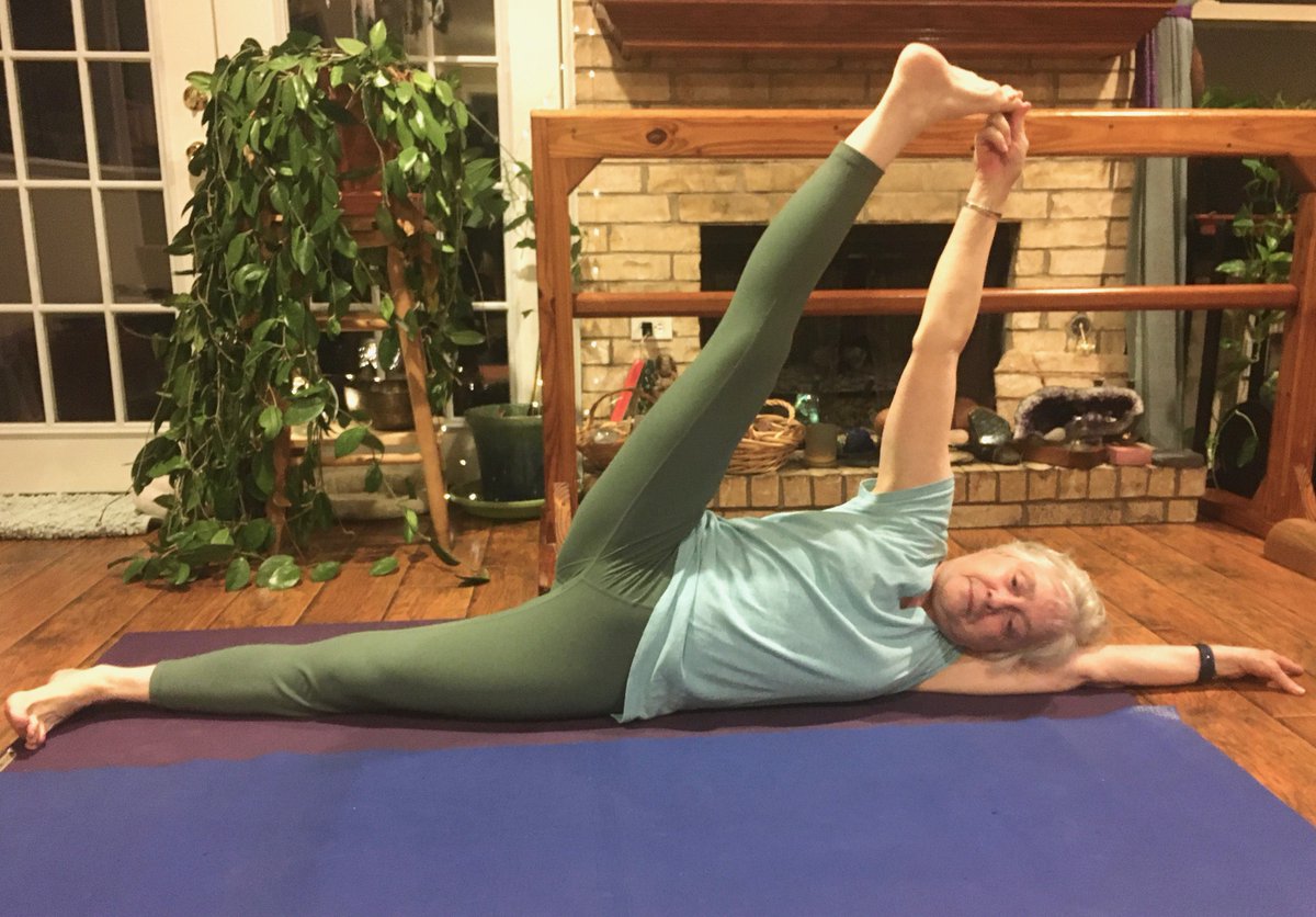 Challenge your core with this mini vinyasa: Start in Supta Padangusthasana I; roll to a head-down Anantasana; hold, then roll back. Move slowly and with control. #IyengarYoga