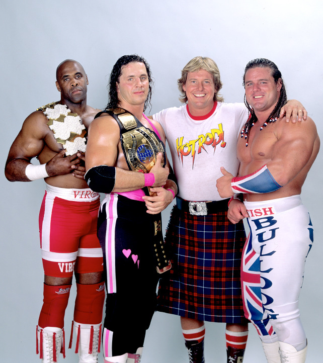 WWFWrestling1's tweet photo. 📸 Survivor Series team of the day! 1991 Team Piper! Virgil, Bret "Hitman" Hart, Rowdy Roddy Piper &amp; British Bulldog. #WWE #Wrestling #SurvivorSeries #Virgil #BretHart #RoddyPiper #BritishBulldog https://t.co/HWhNyzfXXX
