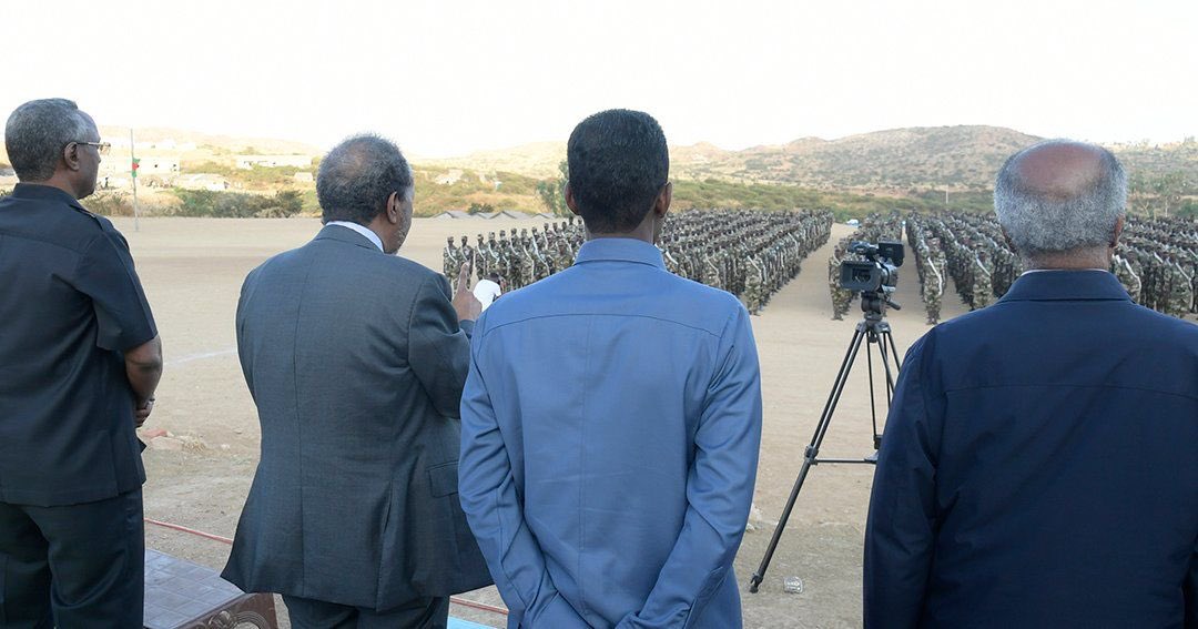 AwHirsiSO's tweet photo. President @HassanSMohamud flanked by Foreign Minister @abshirhuruse pep talks to SNA cadets in #Eritrea.

The superbly trained rough terrain commando and amphibian cadets moulded in Eritrea represent the worst nightmare ever for Al Shabaab terrorist group. #ThereIsNoTurningBack https://t.co/ux3AdNDB1e