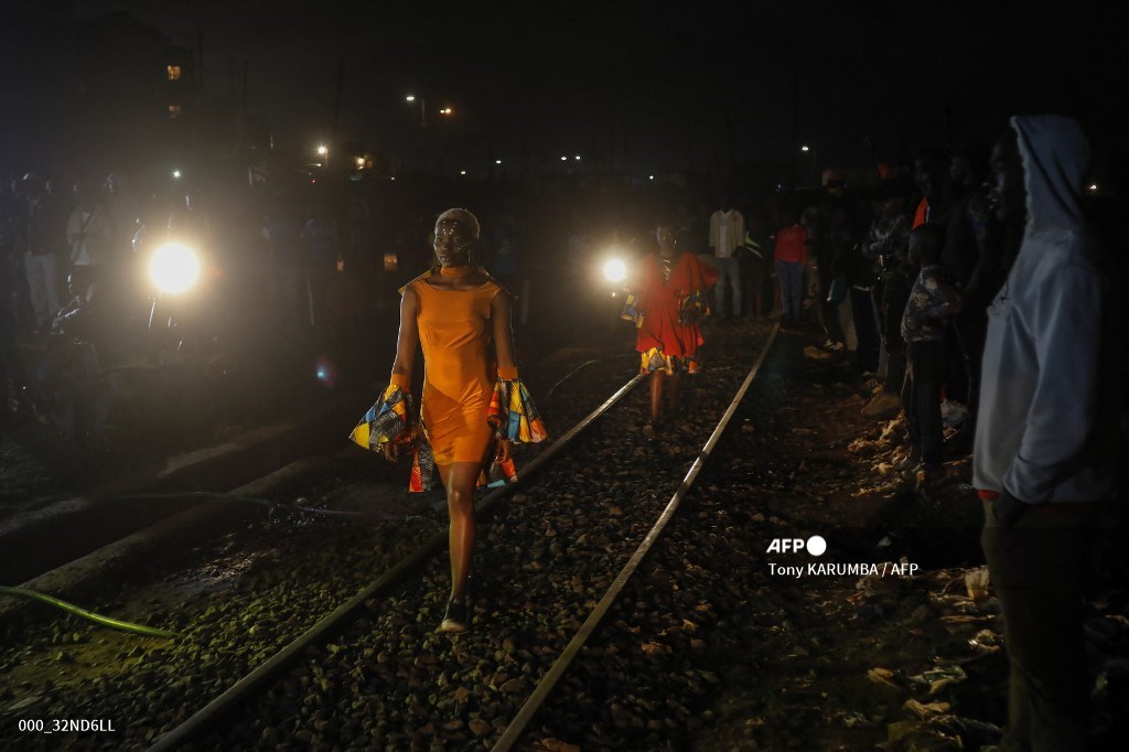 AFP Photo (@afpphoto) on Twitter photo Evening open-air fashion show at the Kibera Fashion Week where several local start-up artists featured a variety of their designs at Nairobi's largest slum, Kibera. 
 📸 Tony Karumba #AFP Evening open-air fashion show at the Kibera Fashion Week where several local start-up artists featured a variety of their designs at Nairobi's largest slum, Kibera. 
 📸 Tony Karumba #AFP