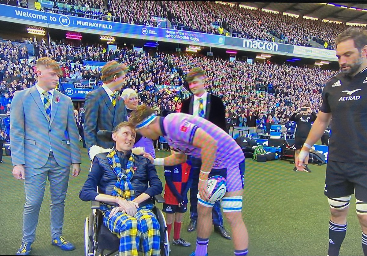 From one legend to another - a moving moment at the start of the game. No dry eyes to be seen.