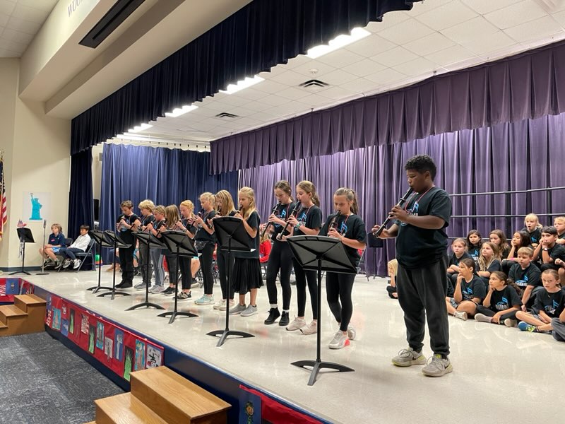 Singers and Ritmo performing at our Veteran's Day celebration on Friday.  They did a great job!