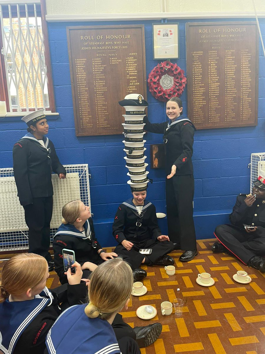 The Band and Ships company pose for our unit photos after the Remembrance Sunday parade. Then a bit of fun cap stacking after hot chocolate and mince pies. BZ all.