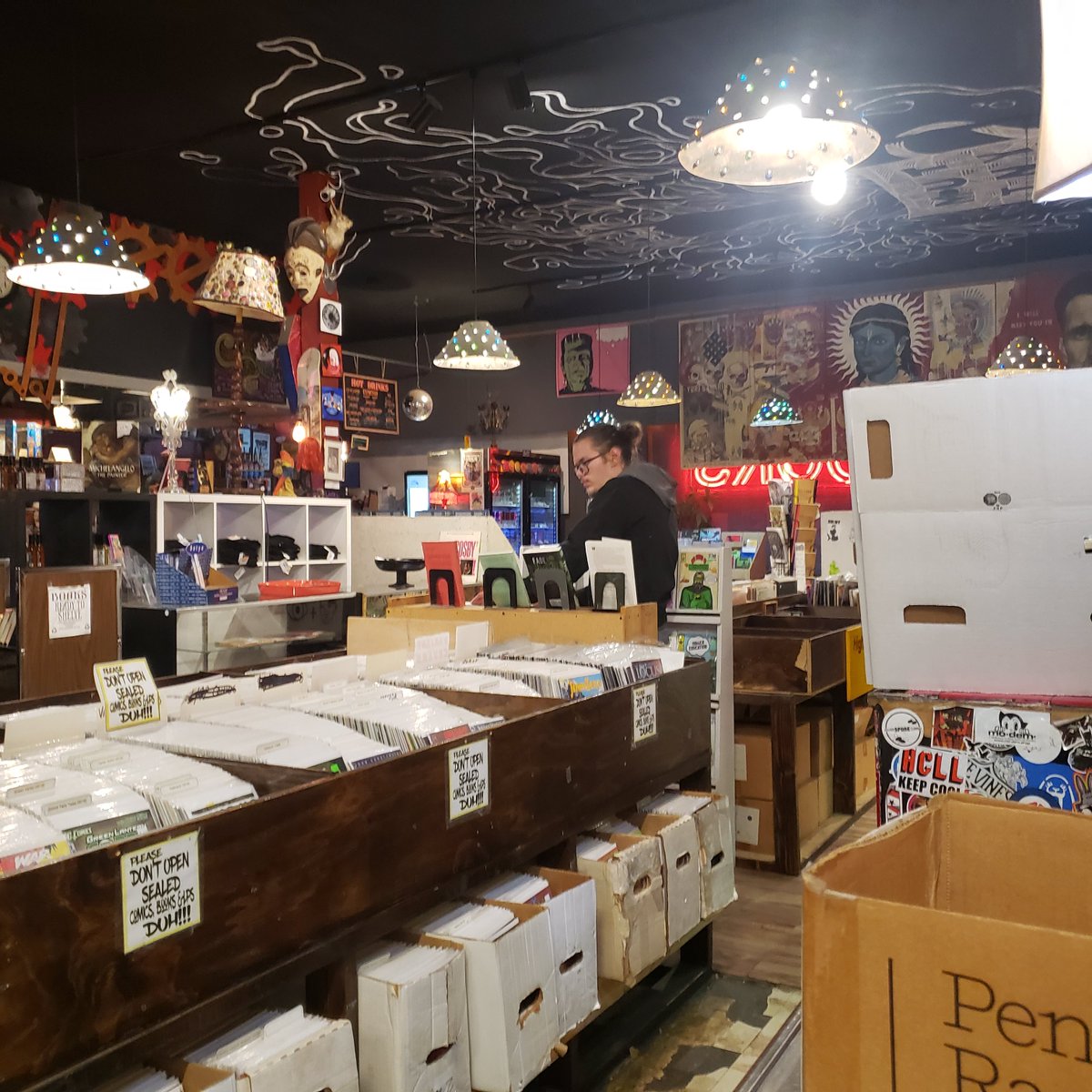 spacecoyotl's tweet photo. one of the coolest places I've stumbled across in Denver so far is Mutiny Information Cafe, a coffee shop &amp; used book store with fiction and artsy titles and comics, that also sells records &amp; Gundam kits &amp; has pinball &amp; an event space &amp; a cereal bar?? So much all in one place https://t.co/cKOs5pThr7