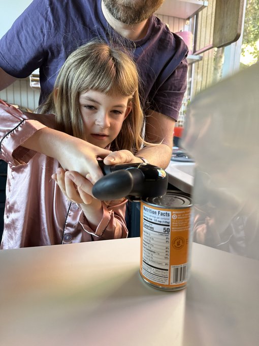 Sutton is using a can opener for the first time. @BradEllis leans forward, he has been waiting for this