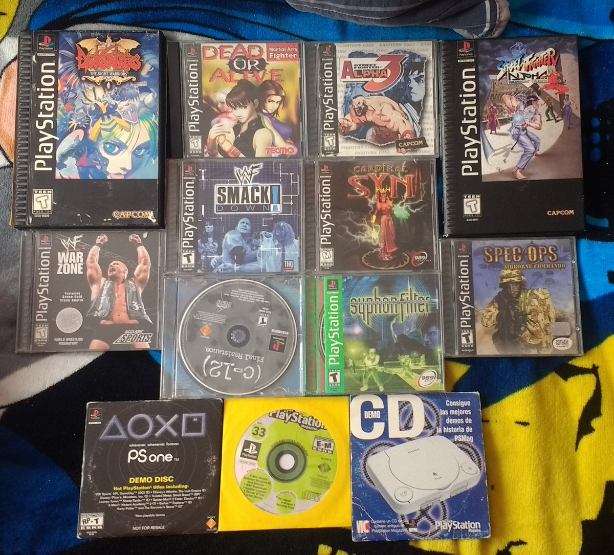 crossman311_077's tweet photo. My entire #PS1 Collection; from NTSC-U to NTSC-J &amp; PAL region games + 3 demo discs, &amp; my 10 favorites!  
#Playstation #PSOne #RETROGAMING #StreetFighterEXPlusAlpha #StreetFighterAlpha3 #DeadOrAlive #DarkStalkers #WWFSmackdown #RivalSchools #RealBoutGarouDensetsu  #PS1DemoDiscs https://t.co/owPpaQFycN