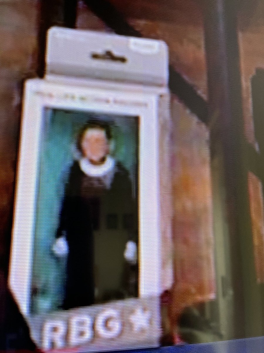 Unite4Us's tweet image. On the shelf behind Michael Moore. I want an RBG Doll. The Republicans disrespected this woman, all she did &amp;amp; accomplished for this country. Mitch shoved an unqualified twot in her seat before she was even buried. #EndGOP