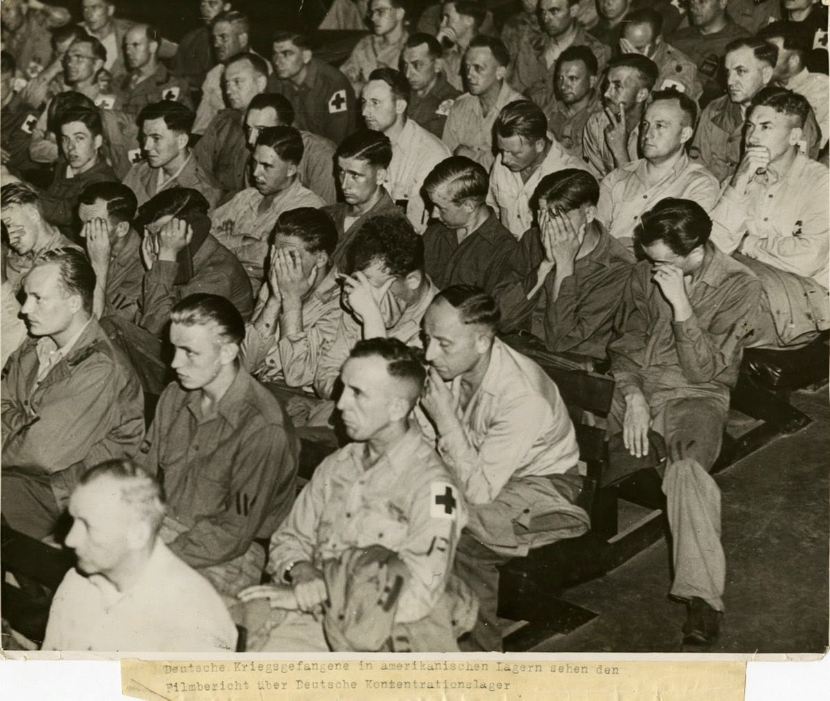HistoryPictory's tweet photo. German soldiers react to footage of concentration camps, 1945 #WWII https://t.co/UDDAHUu4sR