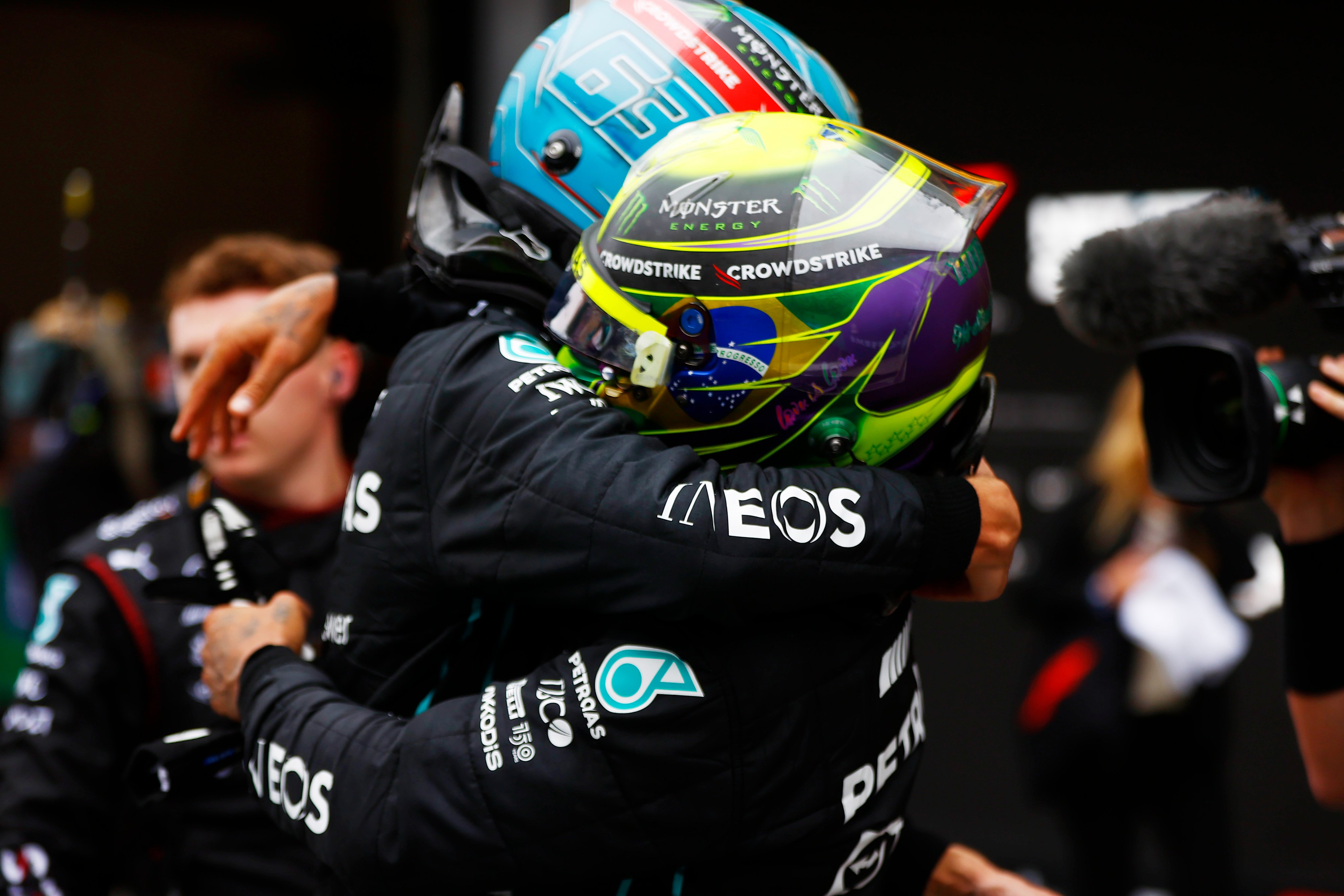 George Russell and Lewis Hamilton celebrate Mercedes 1-2 and Russell's first F1 victory at the 2022 Sao Paulo Grand Prix