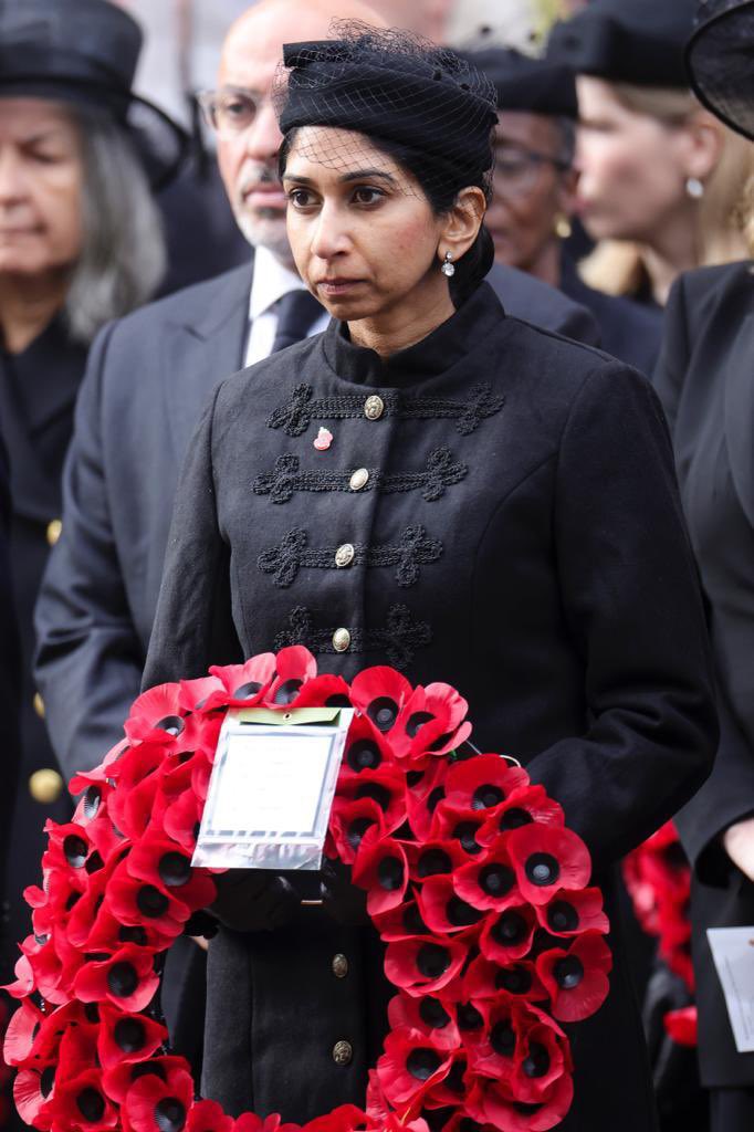 This picture offends the fuck out of me. A fascist laying a wreath to honor those who died fighting fascism.