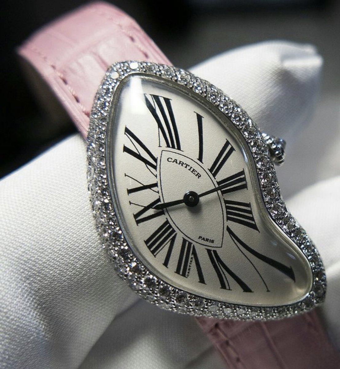 bestofpinkk's tweet photo. pink cartier crash watch https://t.co/worvZGjhik
