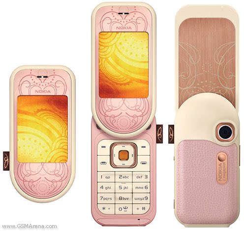 cathrynfraser's tweet photo. @CMKemp24 @GerryMcBride It was a lovely solidly built phone, it was the last non iPhone I had. It had that mirror screen and was competing in the ‘girly phone’ market with the Nokia 7373. Before that I had the gorgeous shocking pink Motorola Razr https://t.co/hnjpQ6pL4W