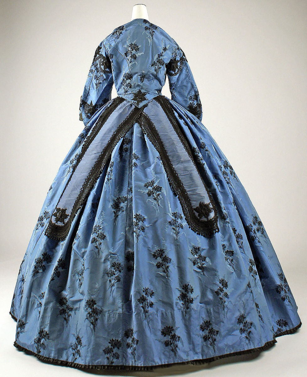 FITfashionstory's tweet photo. This 1863 French silk day dress has a fairly simple and standard silhouette for the period; however the embroidery and cornflower blue color make it extremely fashionable. Read more! https://t.co/Y4JT3hrXQf https://t.co/d6UZ5bJ61f