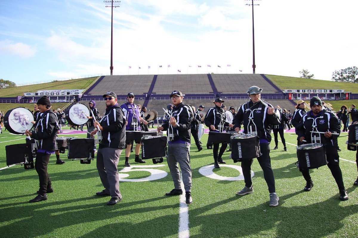 LMB_SFA's tweet photo. While it was a chilly game day morning, it did not stop the LMB for getting ready for halftime. Members were running laps and bringing the energy to get hype for the day. Capturing as many moments as we can, pictures for game day are split up due to the volume of photos. https://t.co/jeTICUmgIL