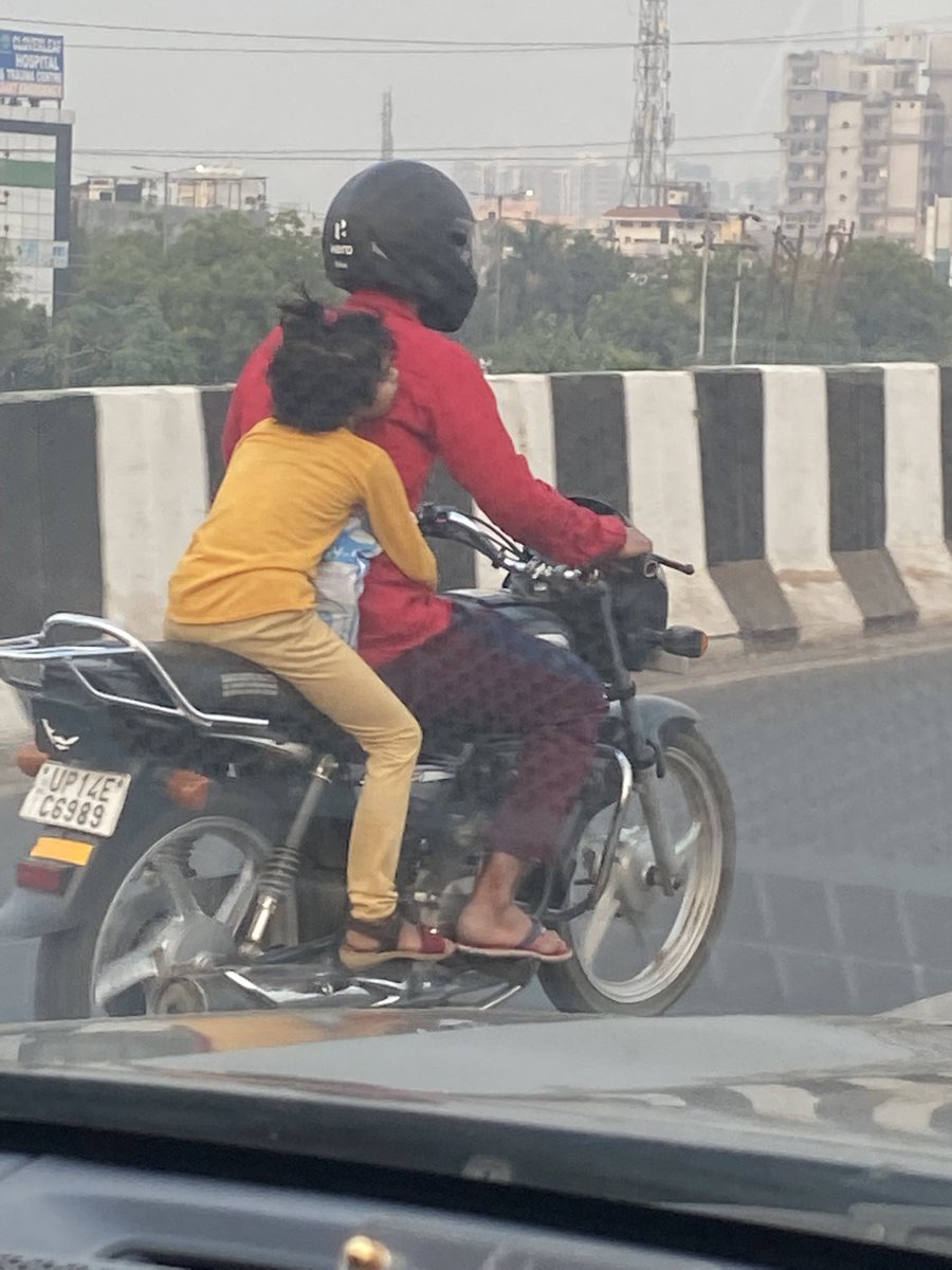 Father is keeping himself safe wearing helmet but not his girl child and driving at high speed on Delhi Meerut Expressway today afternoon. Time to frame strict Rules for safety of minor pillion riders <a href="/PMOIndia/">PMO India</a> <a href="/nitin_gadkari/">Nitin Gadkari</a> <a href="/MORTHRoadSafety/">MORTHRoadSafety</a>