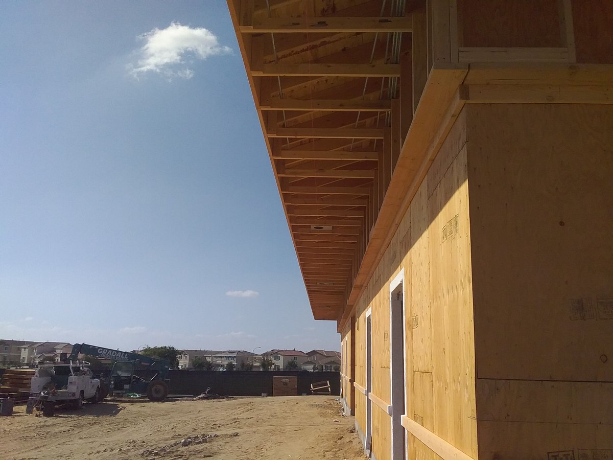 jusdplanning's tweet photo. UPDATE @DelSolAcademy Classroom Addition project:

The wood framing of the new classroom building is complete, and mechanical, electrical and plumbing installation is in progress. Installation of window and door frames has also started. https://t.co/3AuzvKPyHI
