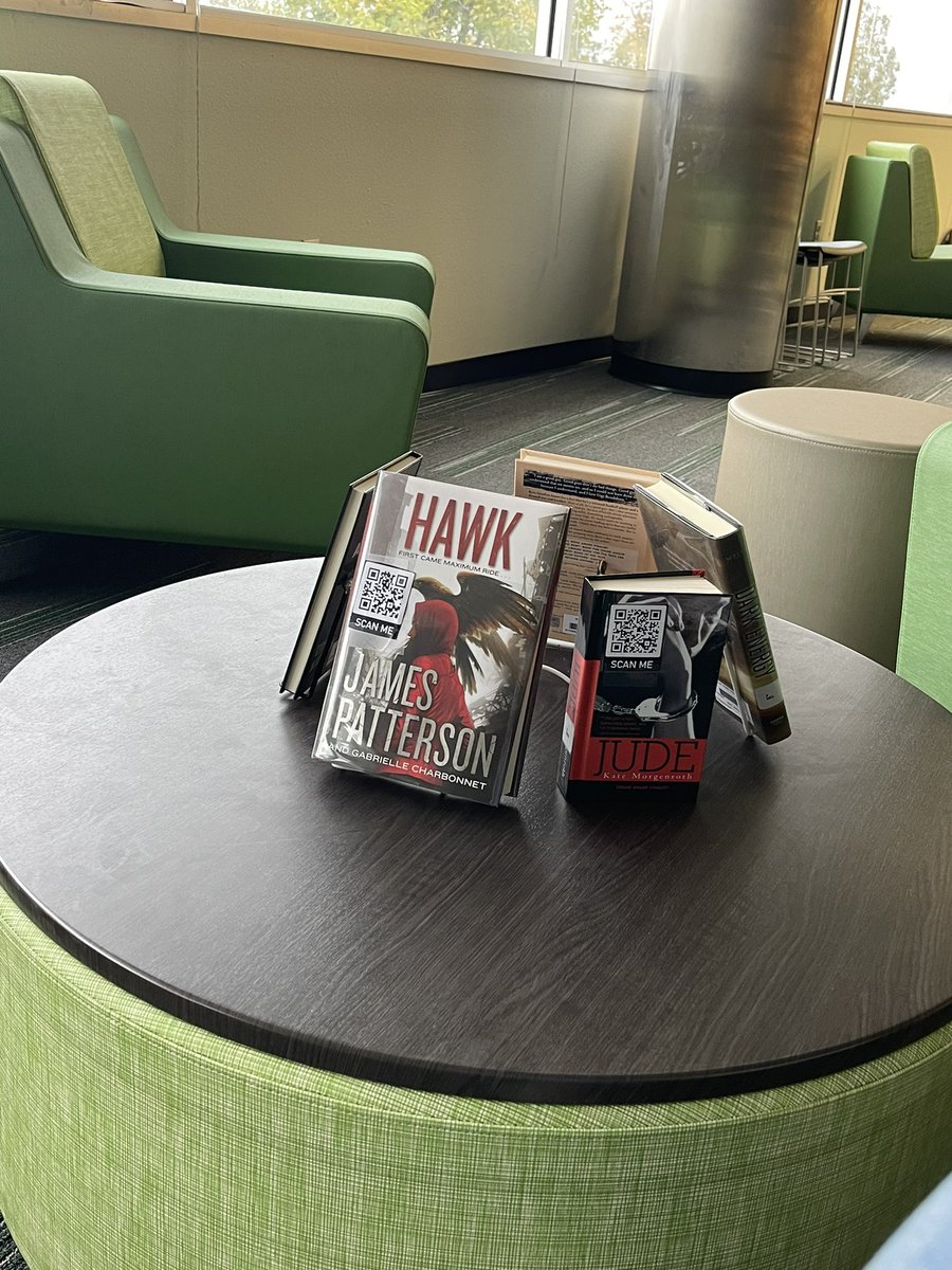 BRTigerLib's tweet photo. BRHS: Come check out our “stache” of new arrivals! If it has a QR code, scan the code to watch a quick book trailer about the book! https://t.co/PBzZG1fQuK