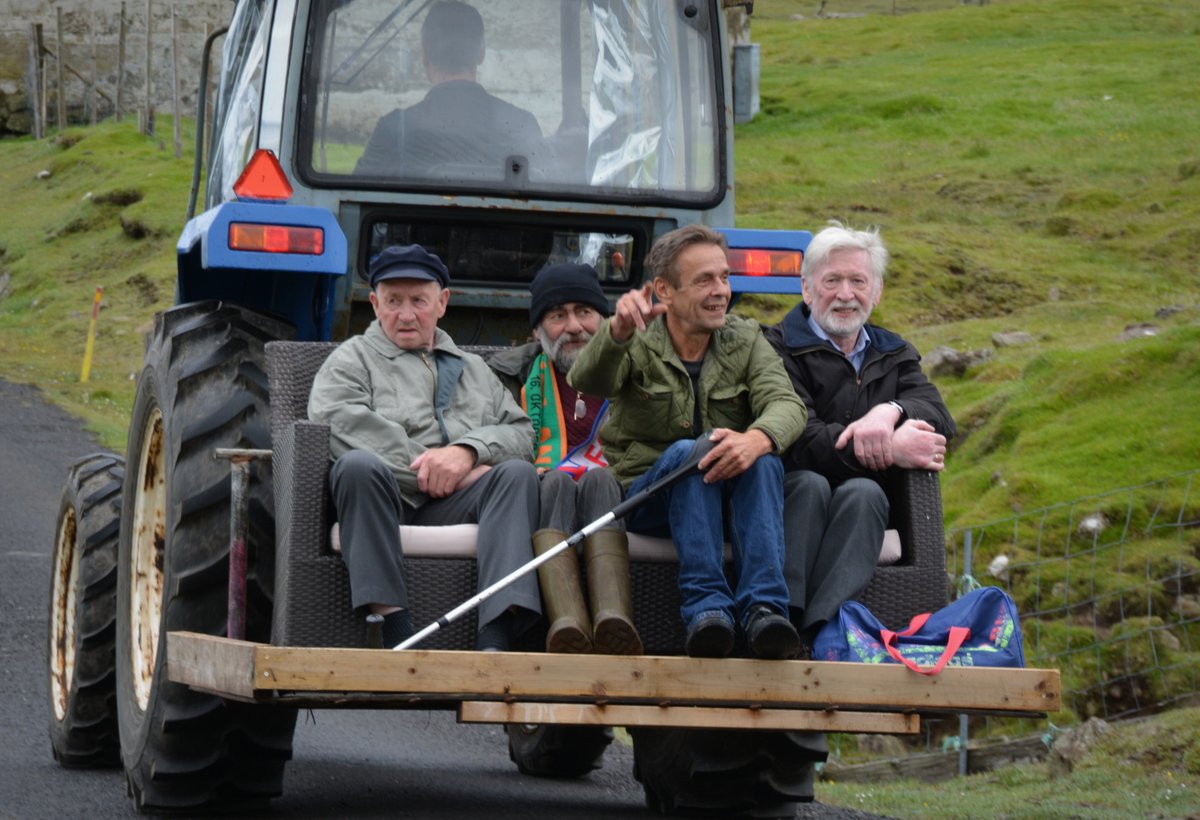 SvinoyFaroes's tweet photo. #Improvised #PublicTransport on #Svínoy, #FaroeIslands. It is 1.6 km from the village to the  #FerryLanding on the North-side. Those in need of a ride, go with the cargo van. This day the van was suddenly out of function. #Tractor and #Sofa #GoTheExtraMile https://t.co/xJdXZ9311H